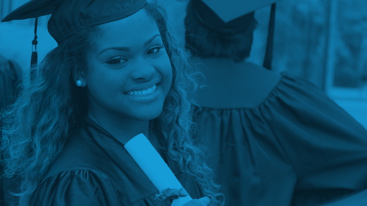 woman with diploma in hand