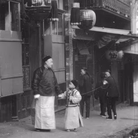 A man and child in the Chinatown, San Francisco, circa 1896–1904.