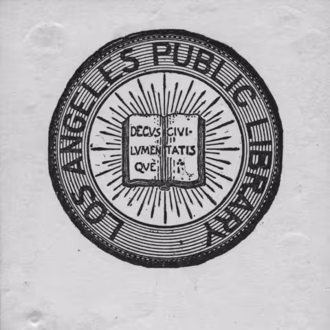 A bookplate for the Los Angeles Public Library with an illustration of an open book in the middle. 