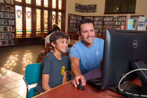 parent and child use library computer