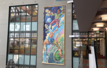 mural hangs from wall