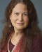 Jane Hirshfield in a red swaeter and pearls
