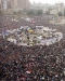 enoumous gathering of people in a city square as seen from above