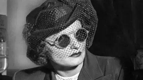 Brenda Allen waits for policewoman Audre Davis to appear at hearing arranged by Judge William McKay. Davis never showed up in court. Herald Examiner Collection, photo dated July 9, 1949