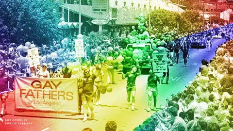 Colorized photo of gay fathers march down Santa Monica Boulevard during the 17th annual Gay Pride Parade