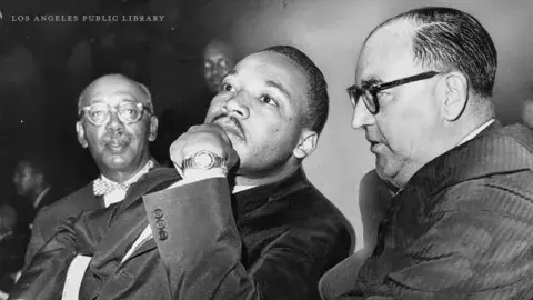 Martin Luther King and Governor Edmund G. Brown during a Freedom Rally at the Los Angeles Sports Arena.