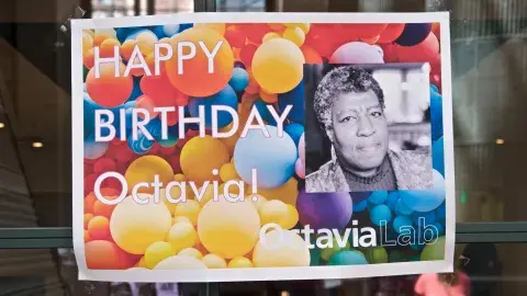 Octavia E. Butler birthday sign on the door of the Octavia Lab