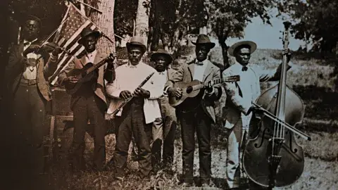 Band performing in Texas for Emancipation Day, 1900