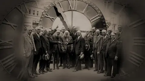	 Officials presenting the old courthouse clock to the Los Angeles County Museum on March 2, 1936. 