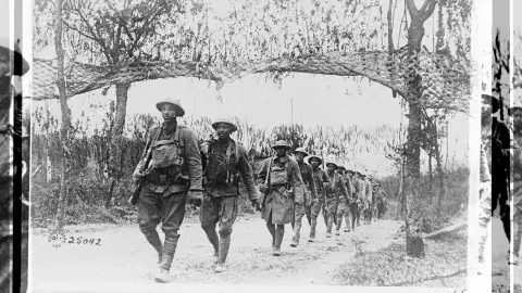 Photo by U.S. Army Signal Corps from Library of Congress [U.S. Army Infantry troops, African American unit, marching northwest of Verdun, France, in World War I]