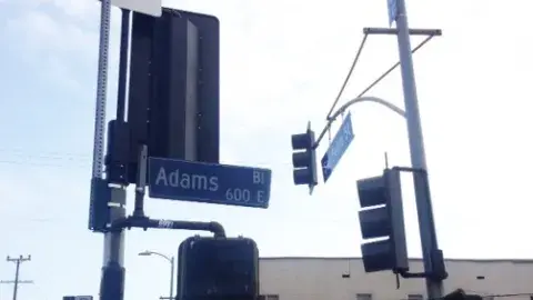 The intersection of Adams and San Pedro today