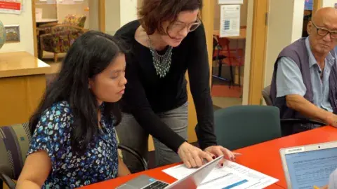 adult students in class with instructor