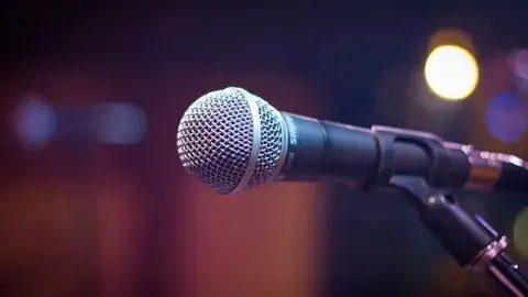 microphone with light behind it