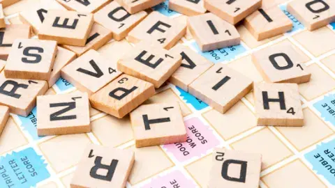 Close up of Scrabble tiles on a Scrabble board