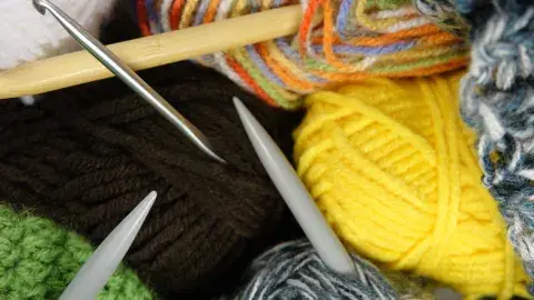 Yarn and knitting needles
