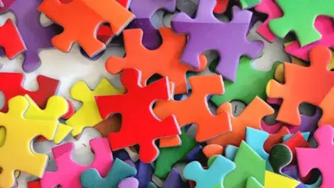 Image of puzzle pieces in vibrant colors