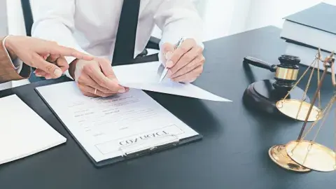 hands holding paperwork