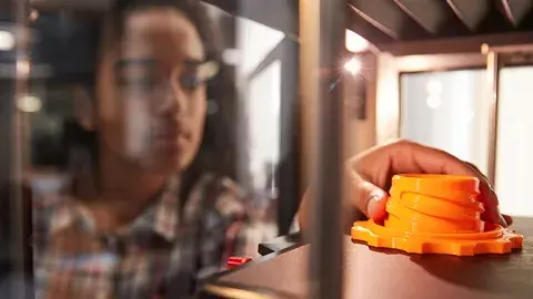 girl with a 3D printer