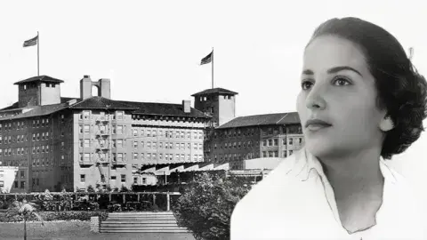 Profile image of a pretty woman with dark hair in front of the Ambassador Hotel. 