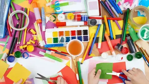 Table full of arts and crafts.