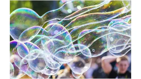 various shaped bubbles in the air