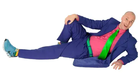 Christopher T. Magician in a blue suit