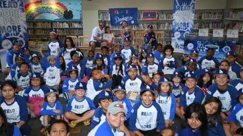 Children attending a Dodgers Storytime posing for a group photo