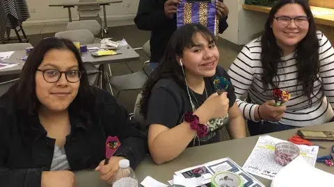 Teen Volunteers Making Duct Tape Flower Pens