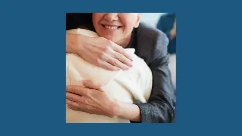 Two people hugging
