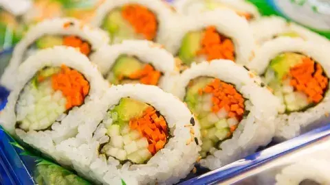 A color photo of cut cucumber sushi rolls, Image by kartynas from Pixabay