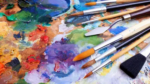 Paint and paintbrushes.