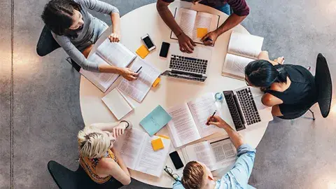 Students sitting around a table