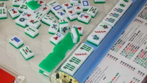 Mah Jongg tiles in mid-game.