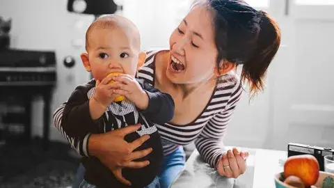 Mother holding baby