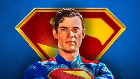Illustration of Superman in front of his logo 