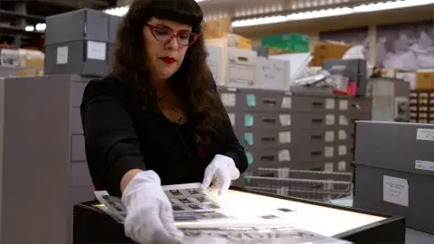 Christina Rice looking at our photo archives