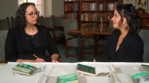 Amanda Charles and Candacy Taylor in the rare books room