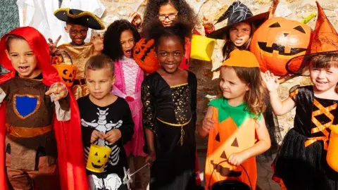 Children in costume at a Halloween party