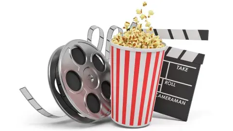Reel of film, bucket of popcorn, and movie clapper