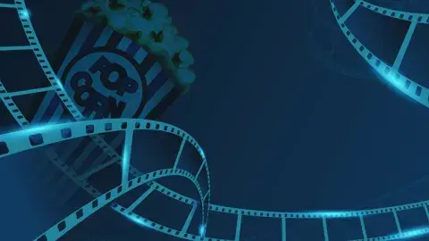 Dark Blue Film Reel with a box of pop corn