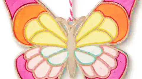 Butterfly suncatcher in shades of pink, yellow, and blue. 