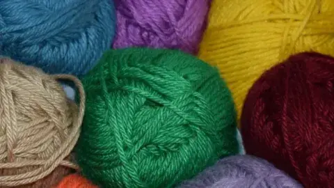 balls of yarn in various colors
