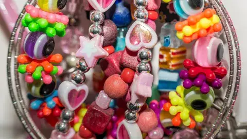 a bowl of colorful beads