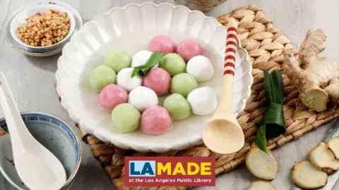 A bowl of multicolor dumplings