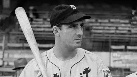 Hank Greenberg holds bat in Detroit Tigers uniform