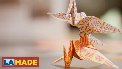 close up of 2 origami cranes