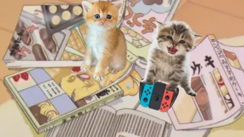 Two kittens on a pile of manga playing Nintendo. 