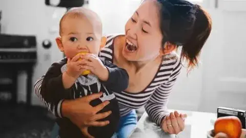Woman holding a baby