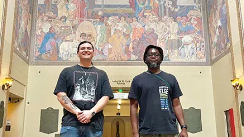 Kwasi Boyd-Bouldin and visual artist River Garza in the Central Library Rotunda