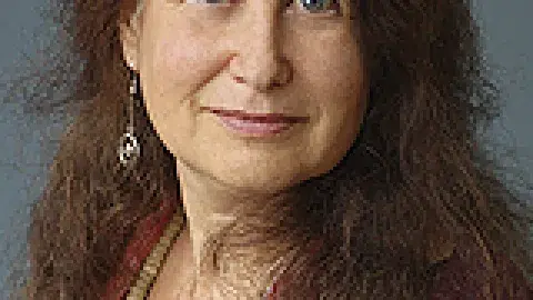 Jane Hirshfield in a red swaeter and pearls